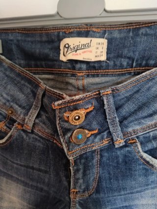 Pantalón vaquero desgastado azul