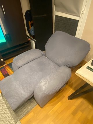 Sillón reclinable, da calor y masajes