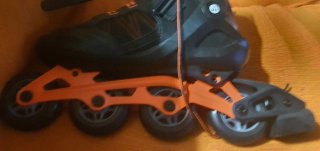 Patines Oxelo 4 ruedas Negro/Naranja