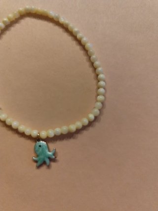 Pulsera concha y acero inoxidable pulpo
