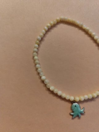Pulsera concha y acero inoxidable pulpo