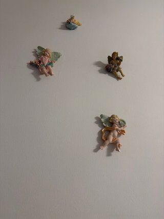 Angelitos decorativos de pared