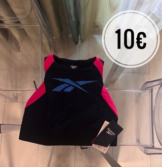 Top deportivo Reebok negro y rosa