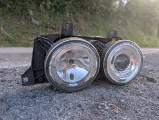 Faro BMW E34 Lado Piloto