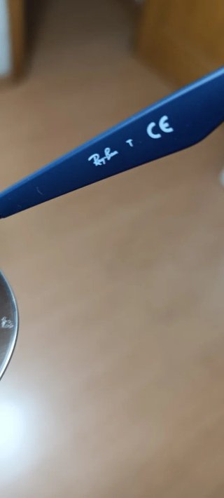 Gafas de sol Ray-Ban plateadas y azul marino