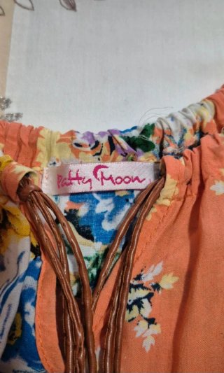 Vestido floral naranja con lazo