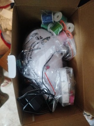 Pequeña máquina de coser