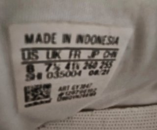 Scarpe Adidas uomo bianche e nere