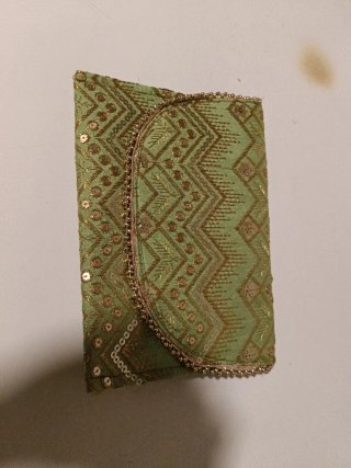 Cartera de mano bordada estilo Handcraft