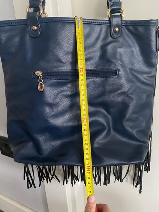 Bolso azul con flecos