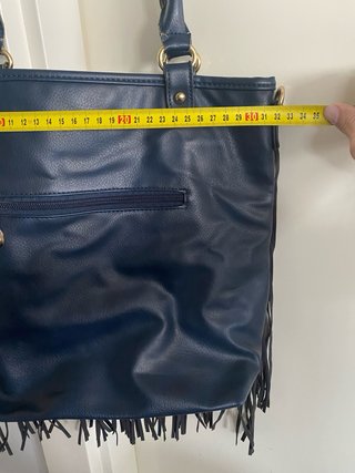 Bolso azul con flecos
