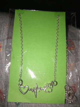 Venta solidaria: Colgante huellas bisuteria