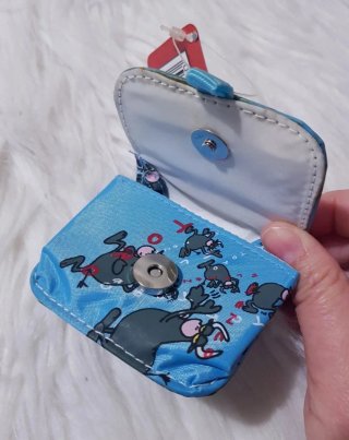 Monedero con dibujos de toros