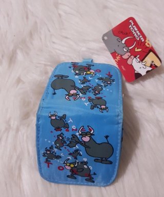 Monedero con dibujos de toros