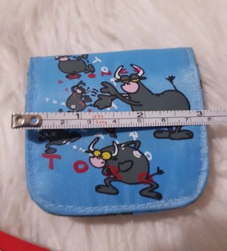 Monedero con dibujos de toros