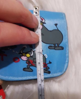 Monedero con dibujos de toros