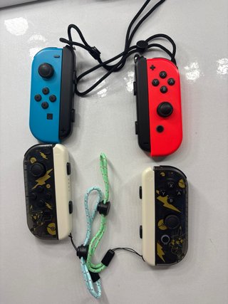 Nintendo Switch Negra + 4 Mandos + 2  juegos