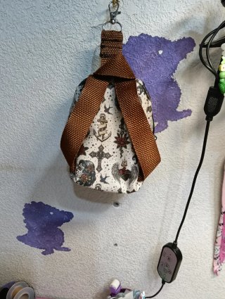 Mini mochila monedero con estampado