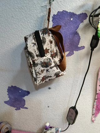 Mini mochila monedero con estampado