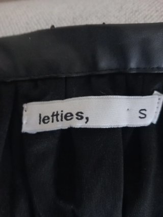 Falda Lefties negra con brillos