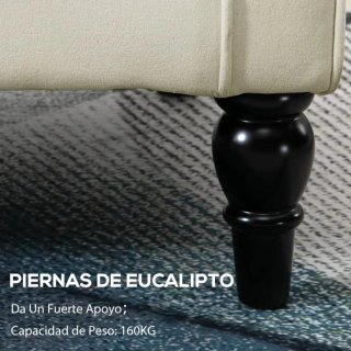 Sillón beige con patas negras