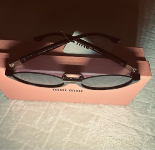 Óculos de Sol Miu Miu Pretos