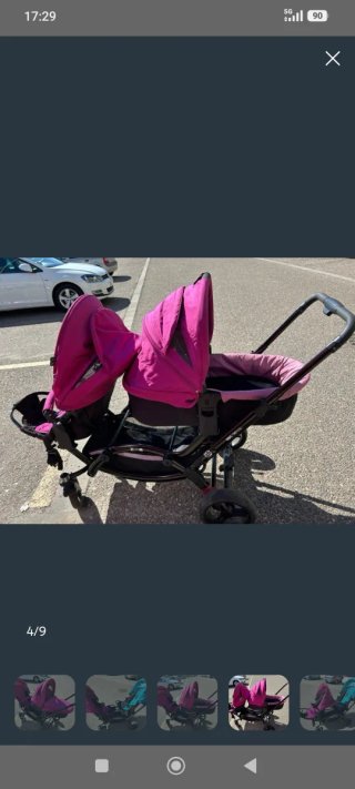 Carrito gemelar color fucsia y azul