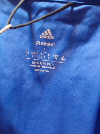 Cortavientos azul Adidas