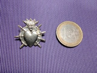 Cuore con 7 coltelli antichi