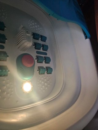 Masajeador de pies con rodillos y luz