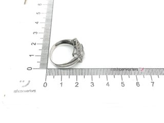 sortija oro 18k con piedra con circonita,aguamarina