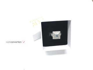 sortija oro 18k con piedra con circonita,aguamarina
