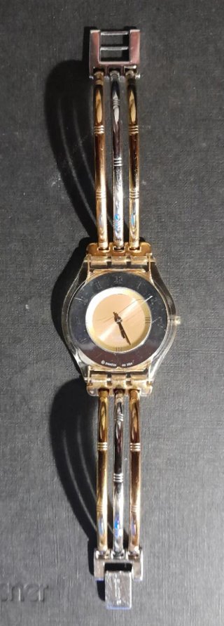 Reloj Swatch tricolor