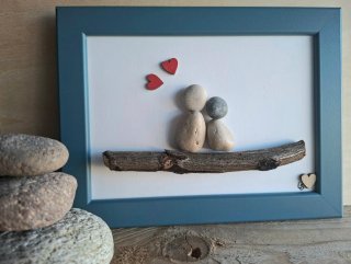 Quadro pebble art fatto a mano.