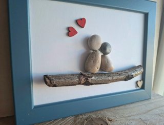Quadro pebble art fatto a mano.