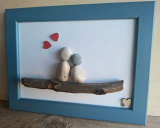 Quadro pebble art fatto a mano.