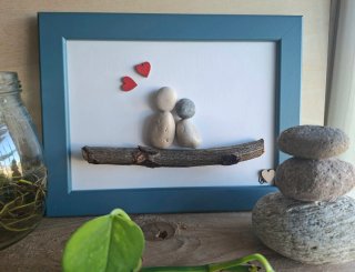 Quadro pebble art fatto a mano.
