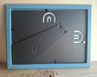 Quadro pebble art fatto a mano.