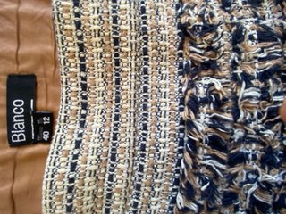 Falda tweed con flecos