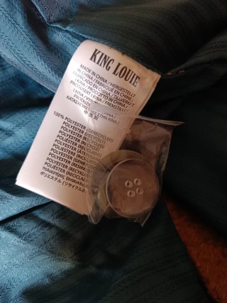 Abrigo cruzado color mostaza King Louie