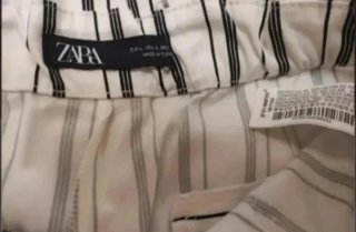 Pantalón corto Zara rayas T. L