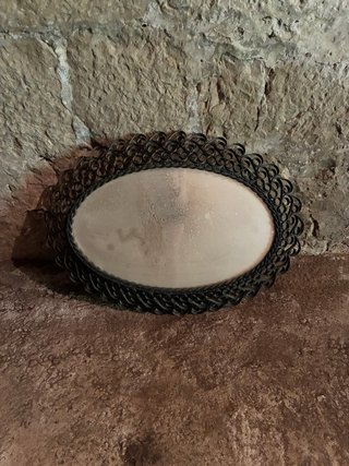 Espejo antiguo de forja ovalado
