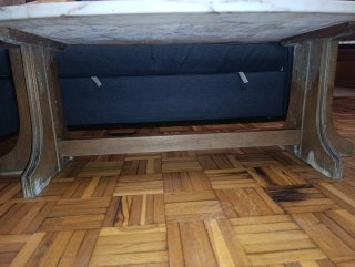 Mesa de centro ovalada de mármol y madera