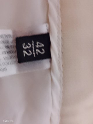 Elegante Pantalón de pinzas lana fría color crema