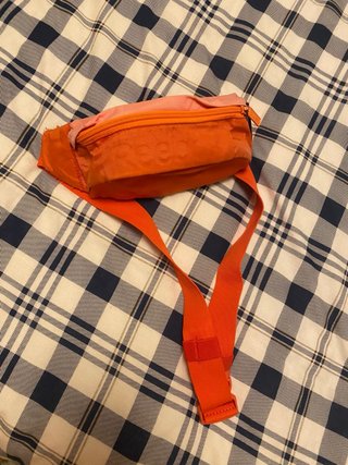Riñonera Reebok Naranja y Rosa