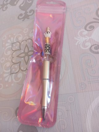 Penna con cristalli e perline