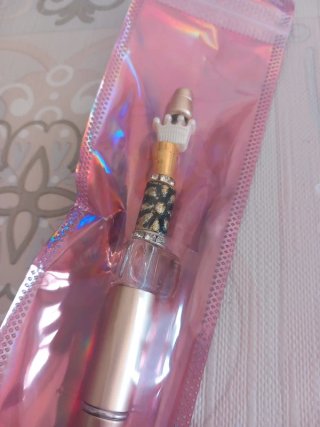 Penna con cristalli e perline