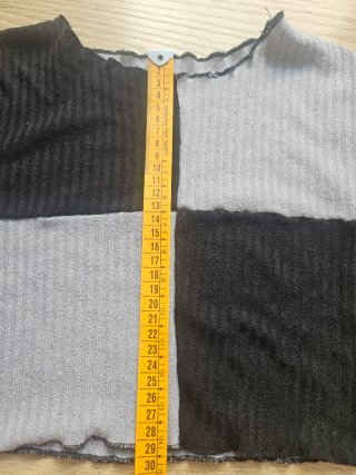 Jersey corto negro y gris