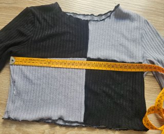 Jersey corto negro y gris
