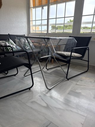 Conjunto de terraza metálico y cristal